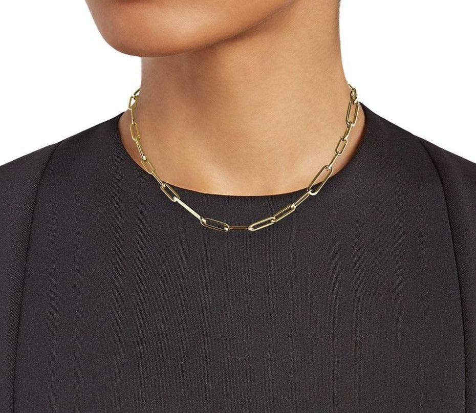 This 18" Italian-crafted necklace is crafted with 18k yellow gold and features a paperclip link style and secure lobster catch. With a thickness of 8mm, it lends ample dimension to your ensemble.