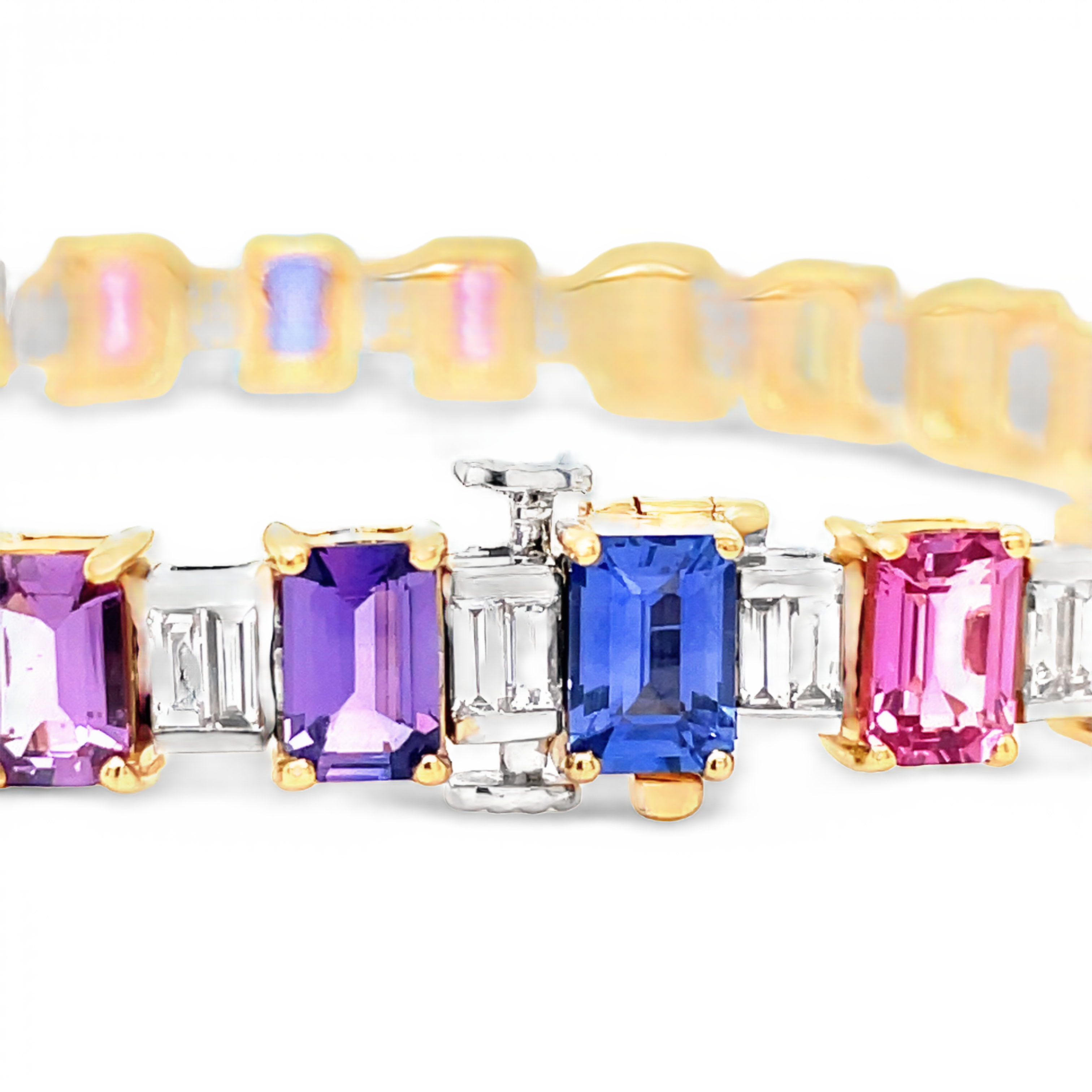 18 yellow gold  Italian made  Sapphire colors ranging from orange, yellow, green, purple, blue & pink  Emerald cut sapphires 16.72 cts  Emerald cut diamonds 2.08 cts   7" long  6.30 mm wide  Gallery finish