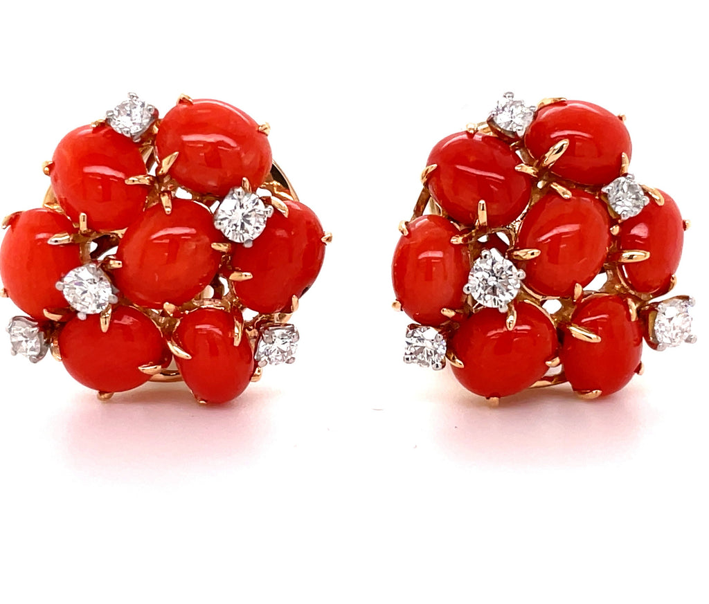 Experience elegance with these Italian 18k yellow gold earrings! Set in a stunning gallery design, while the front showcases gorgeous dandelion coral beads and 0.53 cts of sparkling white diamonds. A secure omega clasp and post guarantee unmatched quality and an elegant 15.00 mm size.