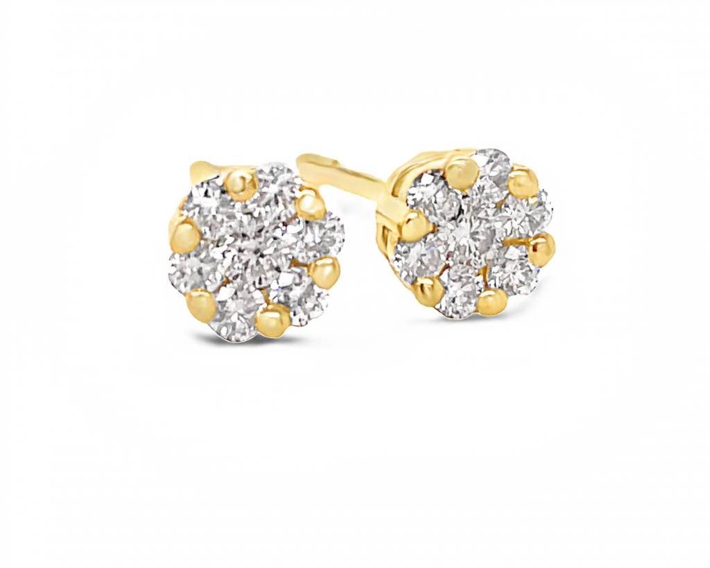 Dainty diamond earrings.   18k yellow gold  Secure heart shaped friction backs  Round diamonds 0.70 cts  5.00 mm long