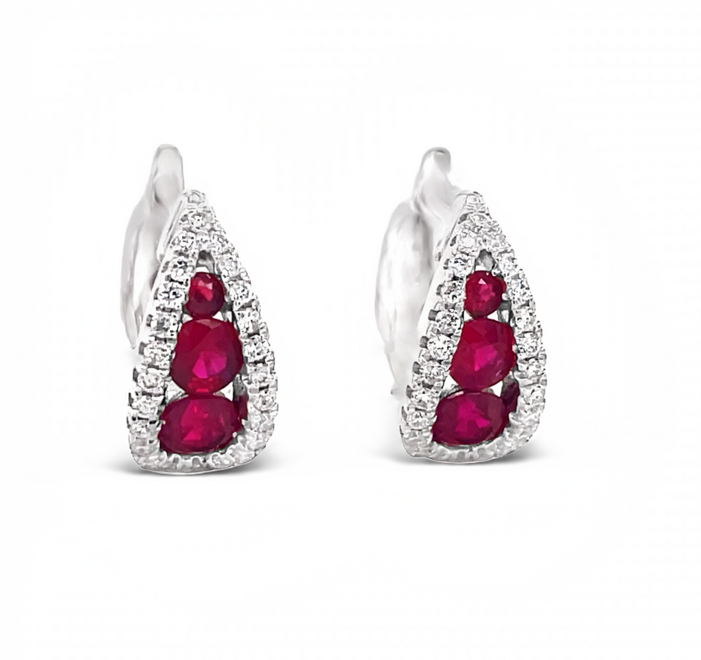 Everyday diamond hoop earrings.   18k white gold  Modern style.  Secure hinge system  Round diamonds 0.90 cts  Three graduated rubies 0.71 cts  F/G color  13.00 x 14.00 mm long.