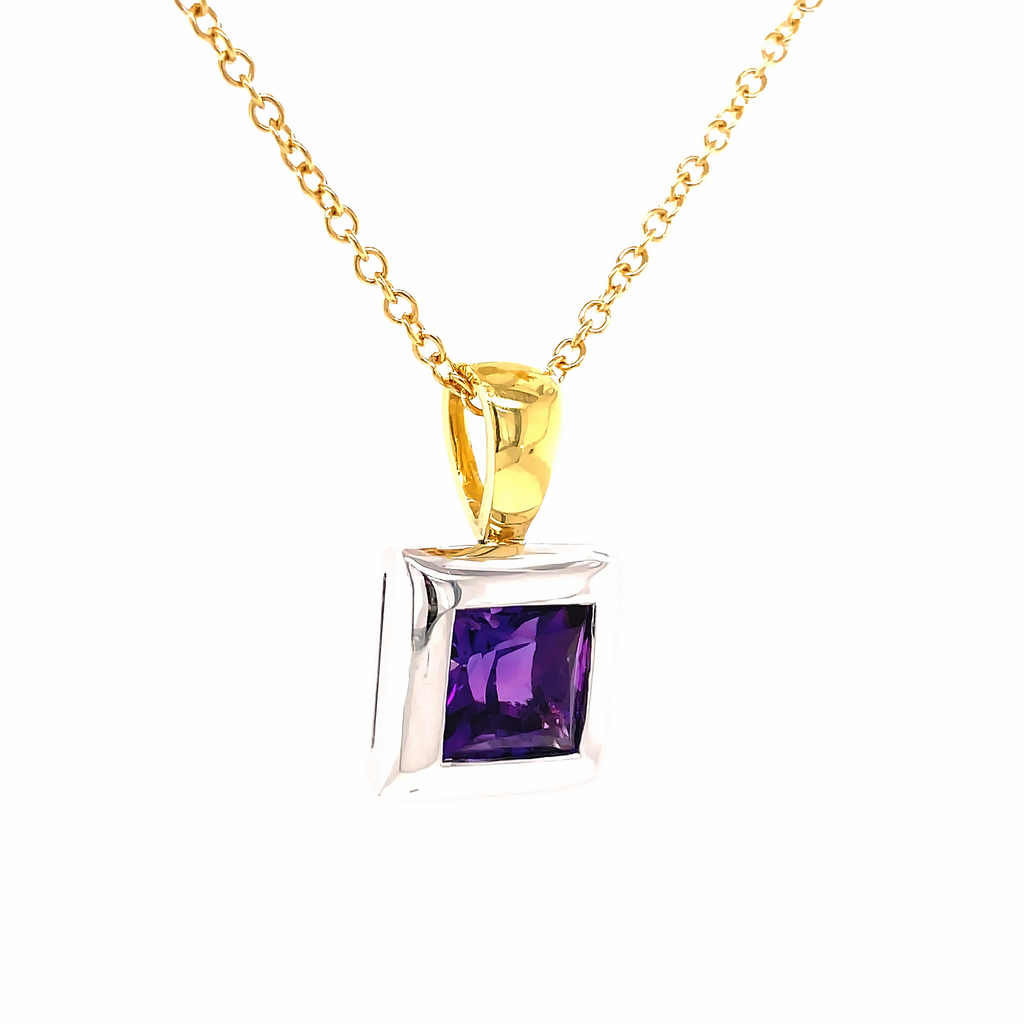Italian made  Faceted amethyst square shape   24.00 x 15.00 mm  Set in 18k white gold mounting  Large 18k yellow gold bail  Gallery finish