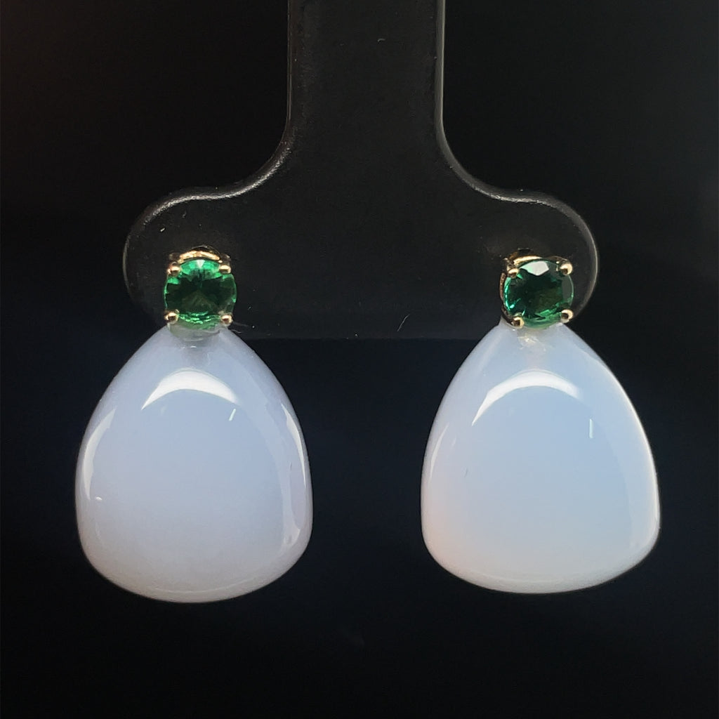 A timeless piece of jewelry, crafted with pear shape agate cabochons and emerald cabochons, and firmed in 14k yellow gold with a secure friction backing. Measures 18 x 12 mm.