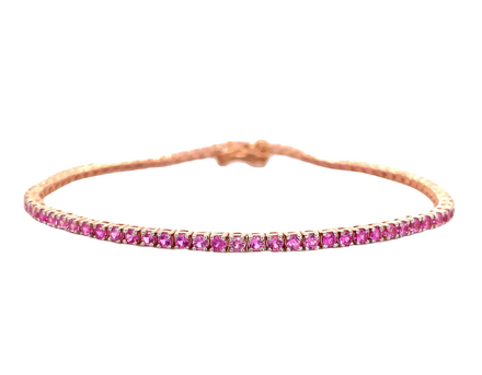 Dainty & beautiful bracelet   14k rose gold  Round pink sapphires 2.97 cts   Two figure eight for safety  Hidden clasp  7" long sizing loops  Secure lobster catch