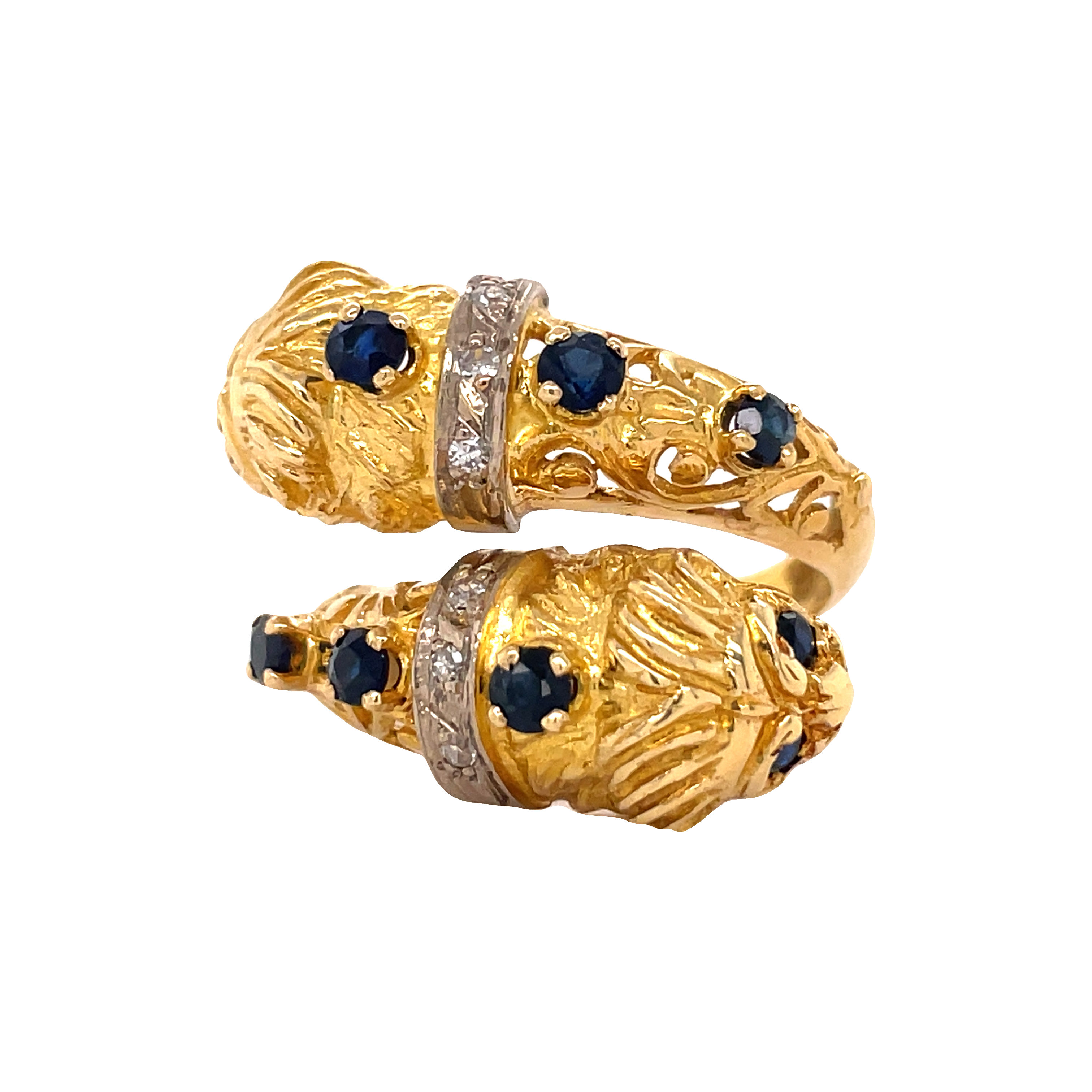 Beautiful estate jewelry ring.  14k yellow gold antique ring  Round diamonds   Round sapphires   Great condition.  Crossover lion faces