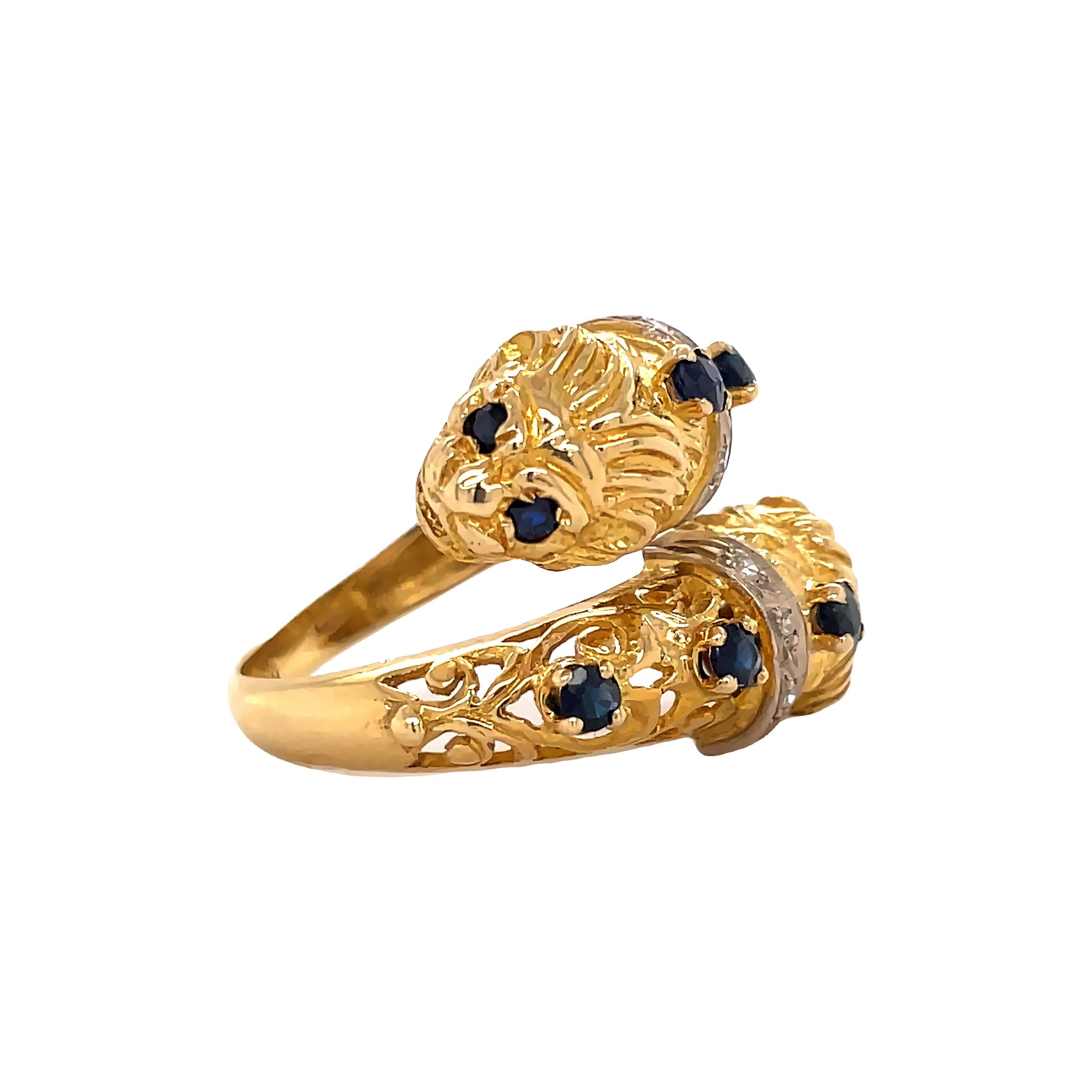 Beautiful estate jewelry ring.  14k yellow gold antique ring  Round diamonds   Round sapphires   Great condition.  Crossover lion faces