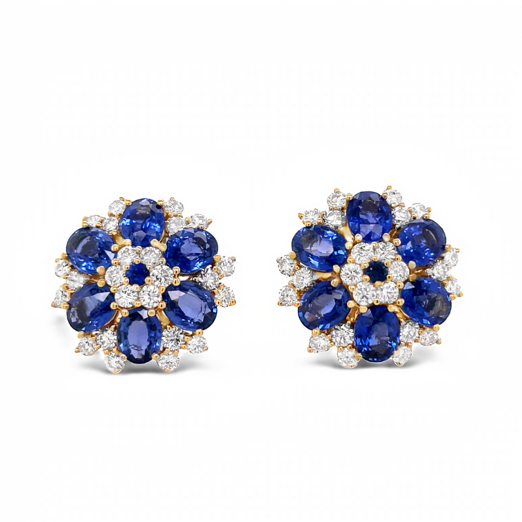 Set in 18k yellow gold  Gallery design at the back   Round diamonds & oval sapphire  Secure friction backs  18.00 mm 