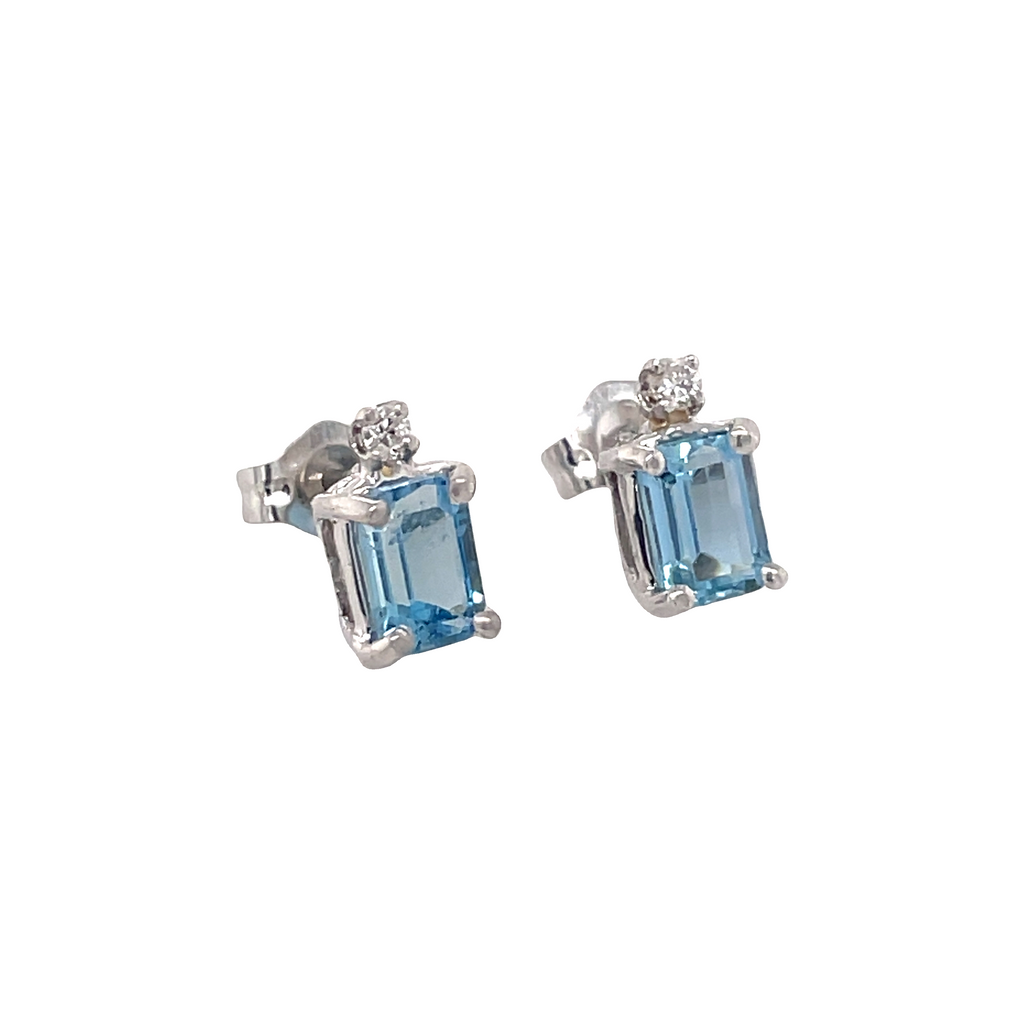Two Aquamarine earrings   Two small diamonds   14k white gold  Secure friction backs 