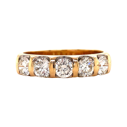 14k yellow gold ring  Five round diamonds    1.00 cts wide  Great condition.  Stackable rings.  4.40 mm 