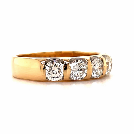 14k yellow gold ring  Five round diamonds    1.00 cts wide  Great condition.  Stackable rings.  4.40 mm 