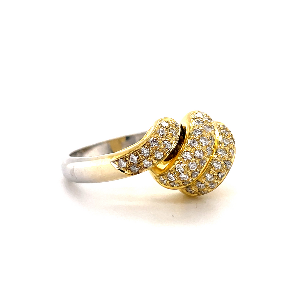 This contemporary-inspired design features a triple coil form made of 18k yellow and white gold with a matte finish. Each coil holds eleven round diamonds with a total carat weight of 0.41cts. Ring is size 7.5 and resizable. 11mm wide.