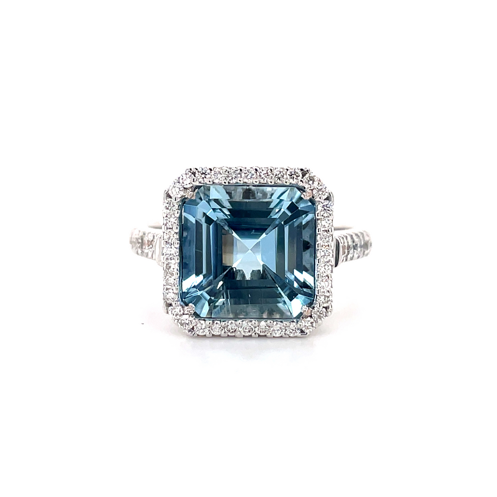 Italian made ring  Asscher cut aquamarine 3.98 cts  Surrounded by white round diamonds 0.24 cts   Size 6.5  Set in 18k white gold   14.17 mm 
