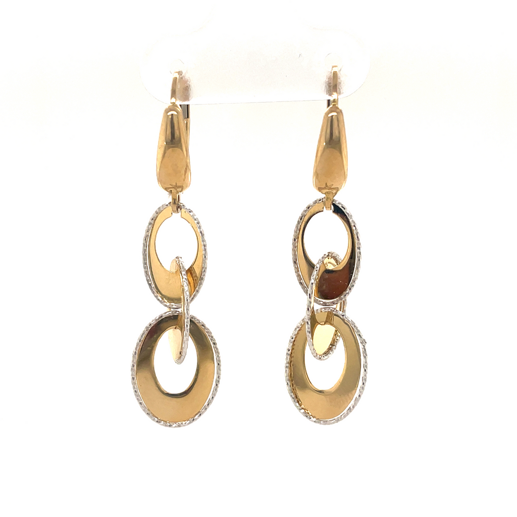 14k yellow & white gold.  Italian made  Secure lever back  Three oval shape circles  30.00 mm long  Lightweight 