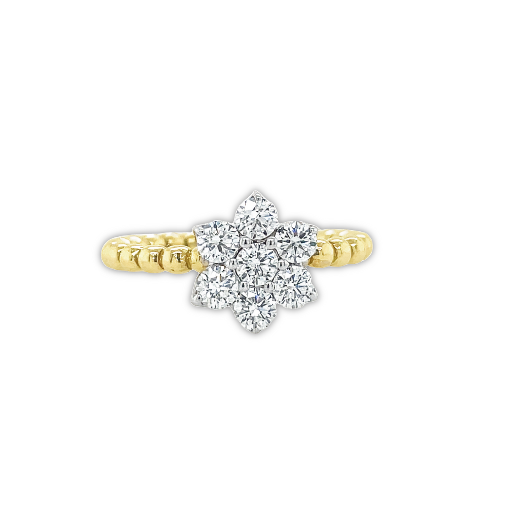 A breathtaking ring crafted with the 18K yellow and white gold and diamonds (0.71 cts). Adorned with an intricate flower motif, this ring is the perfect piece to add a dazzling, timeless touch to any outfit. Size 6.5, 10.50 mm.