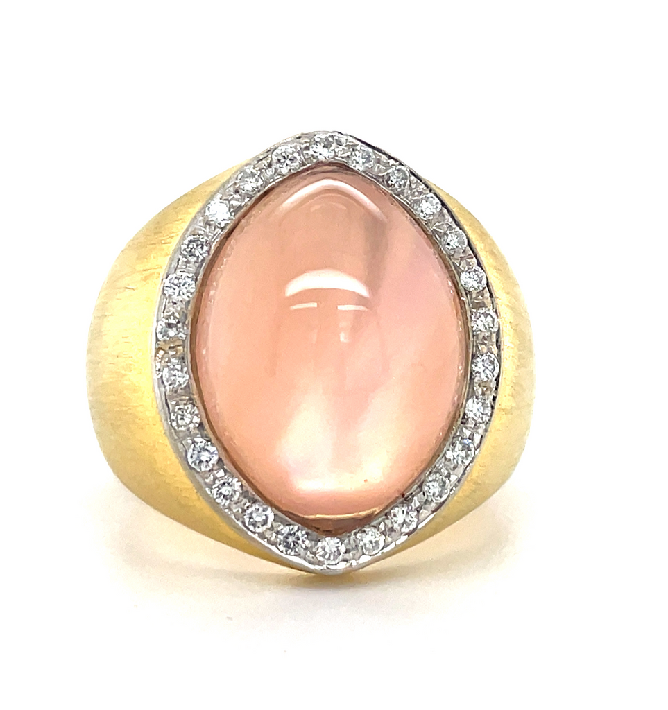 Italian made  18k yellow gold  Bossio Bruni Collection  Surrounded by white round diamonds 0.50 cts   Size 6.5  Oval  pink quartz  25.00 mm  Matte finish shank 