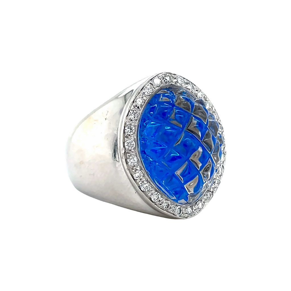 The Blue Spike Glass Diamond Ring is from the Pascale Bruni Collection and crafted in 18k white gold. This Italian-made ring features a 7.0 size (sizable) with a special spike glass inlay of thin opal, and is adorned with round diamonds at 0.24 cts.