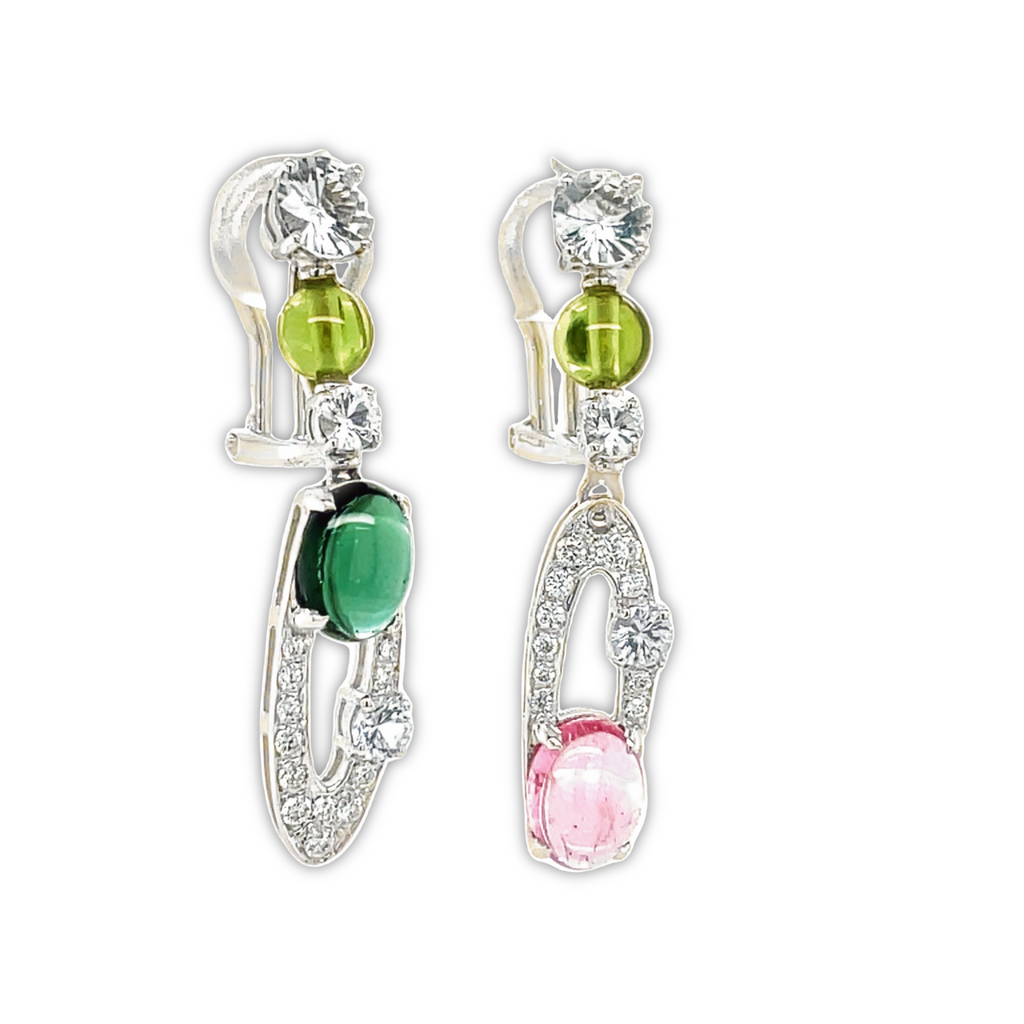 18k white gold  Green & pink cabochon tourmalines  Round white sapphires   Round diamonds 0.25 cts  1.5" long  Omega system