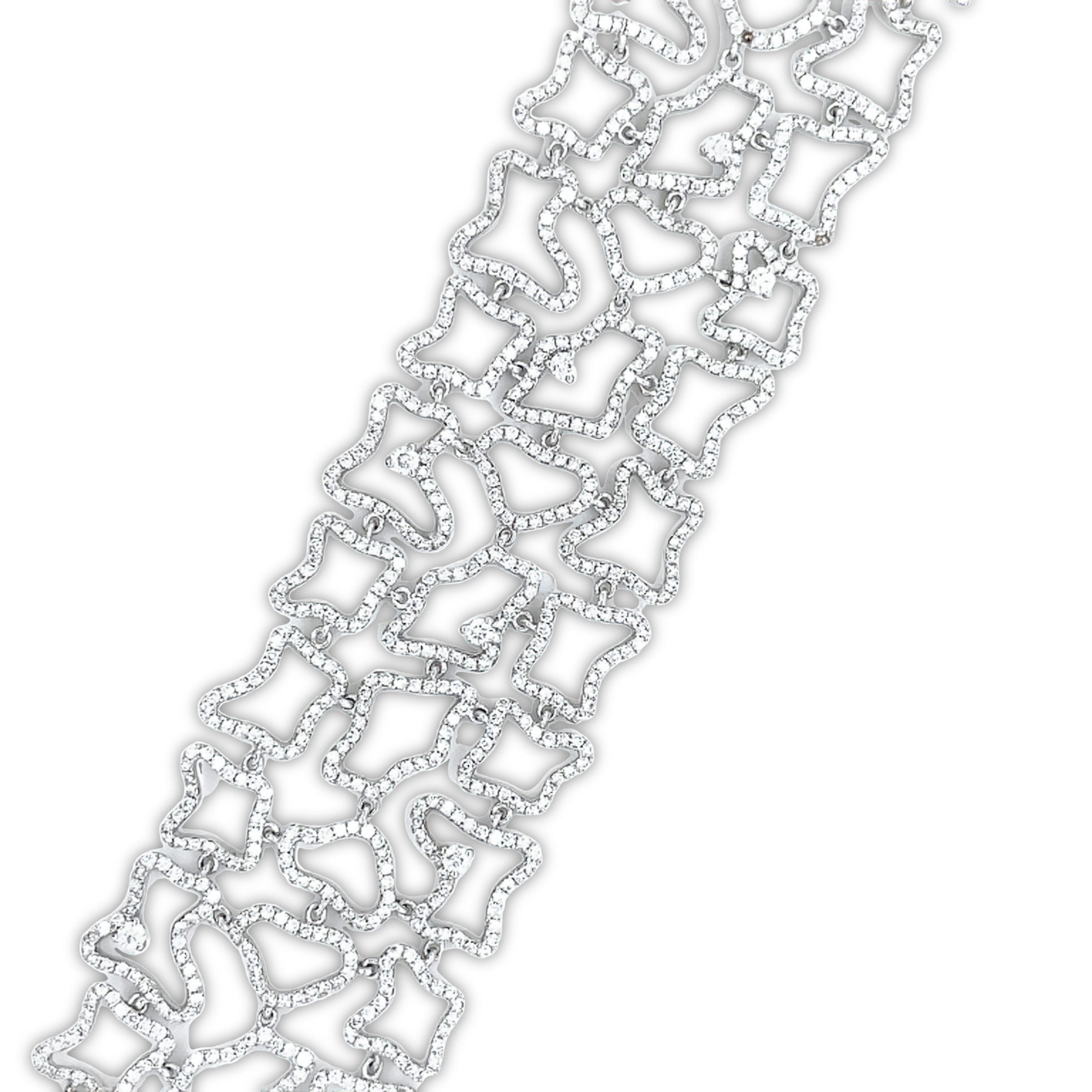 This 18k White Gold Wide Diamond Lattice Bracelet features high quality diamonds weighing 6.19 cts, with an E/F color grade. The width of the bracelet is 1.5" and each side of the sizing loop is 1.5". It is secured with a lobster catch and is 8" long. An incredible piece to behold.