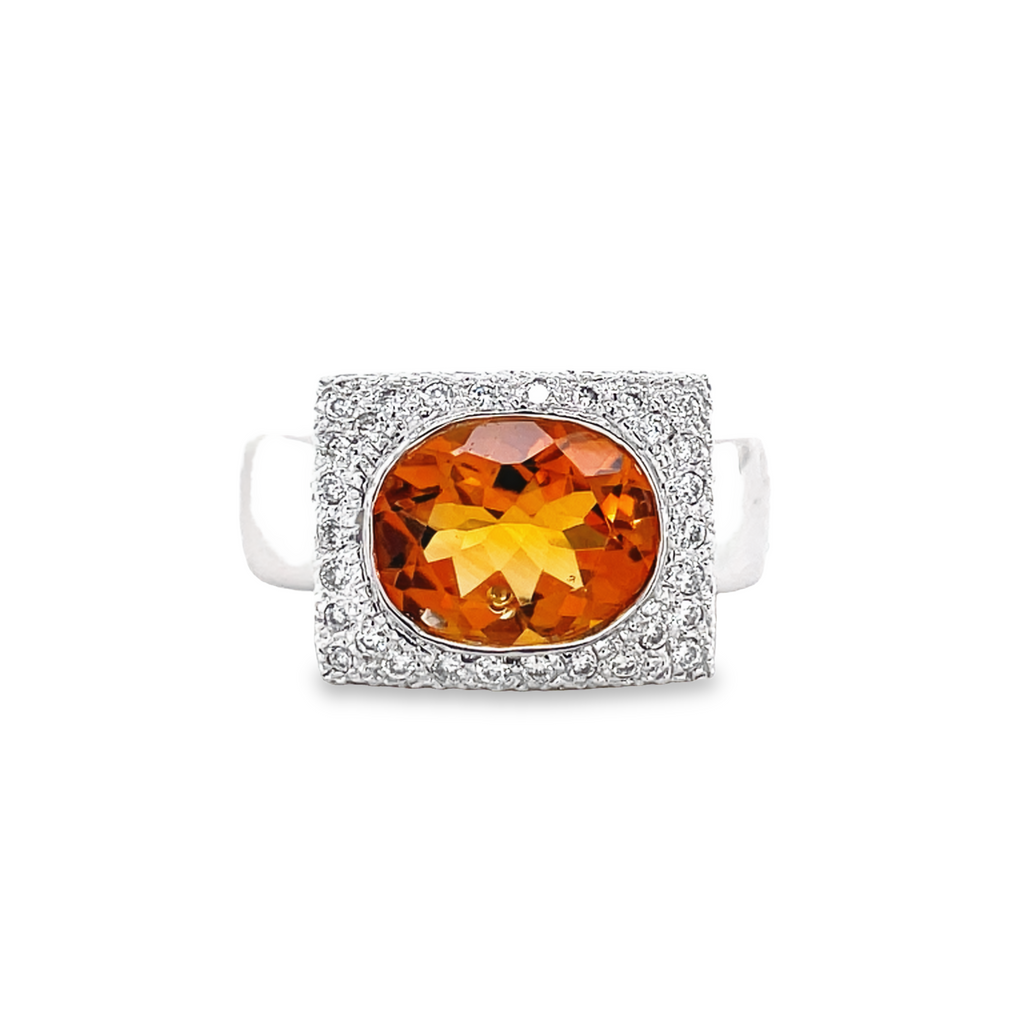 Oval citrine 2.11 cts  Round diamonds 0.33 cts  11.50 mm   7.0 size (sizable)  14k white gold  Thick shank 