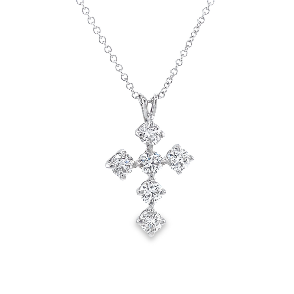 This stunning Classic Share Prong Diamond Cross Pendant Necklace is a timeless piece. Crafted from 18k white gold, it features a diamond cross with 1.00 cts of color E/F and VS1 clarity, for a beautiful sparkle. Perfect for any special occasion.  Chain is optional 18" long $325.00