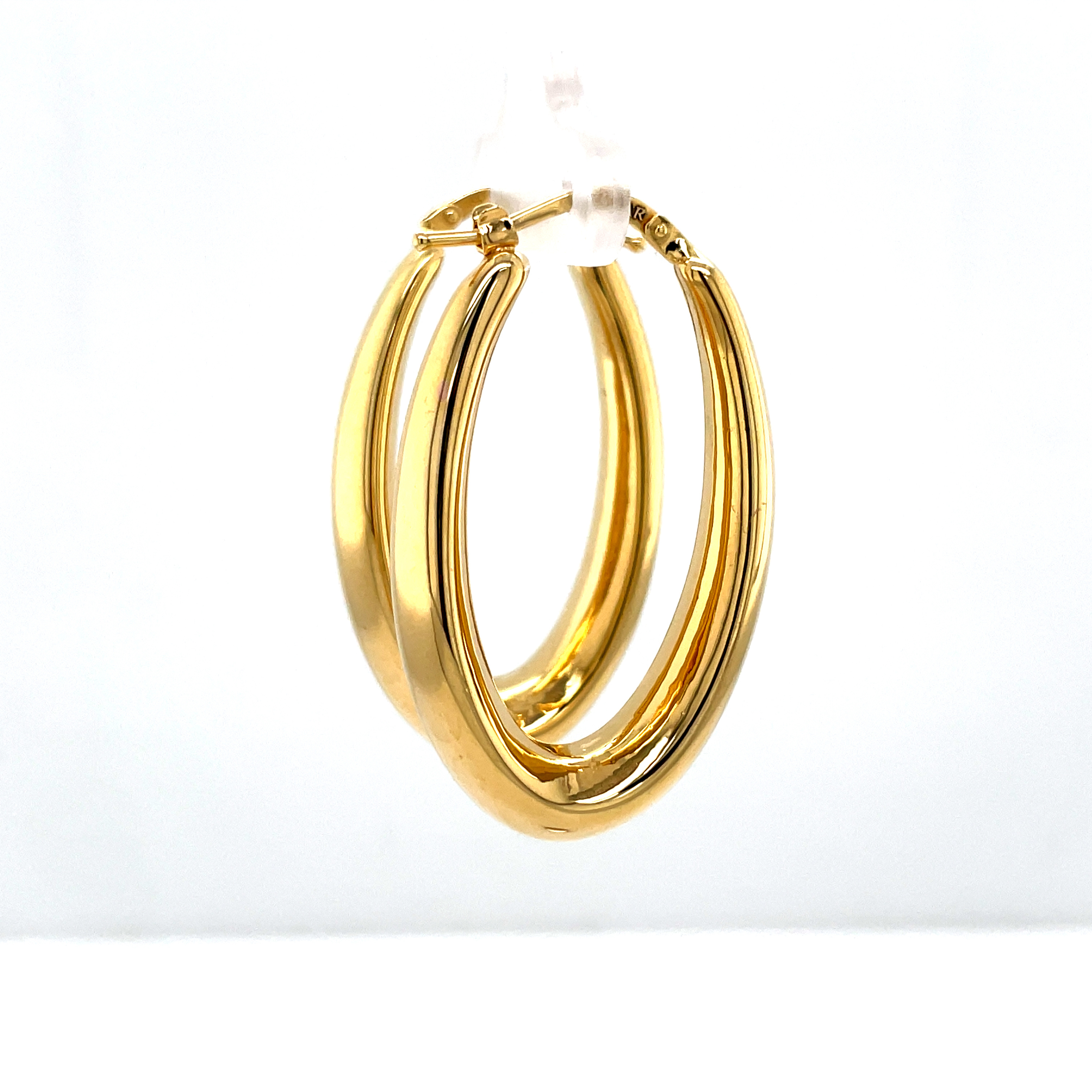 14k yellow gold.  Italian made  Secure hinged system   Large hoops   1.5" inches long