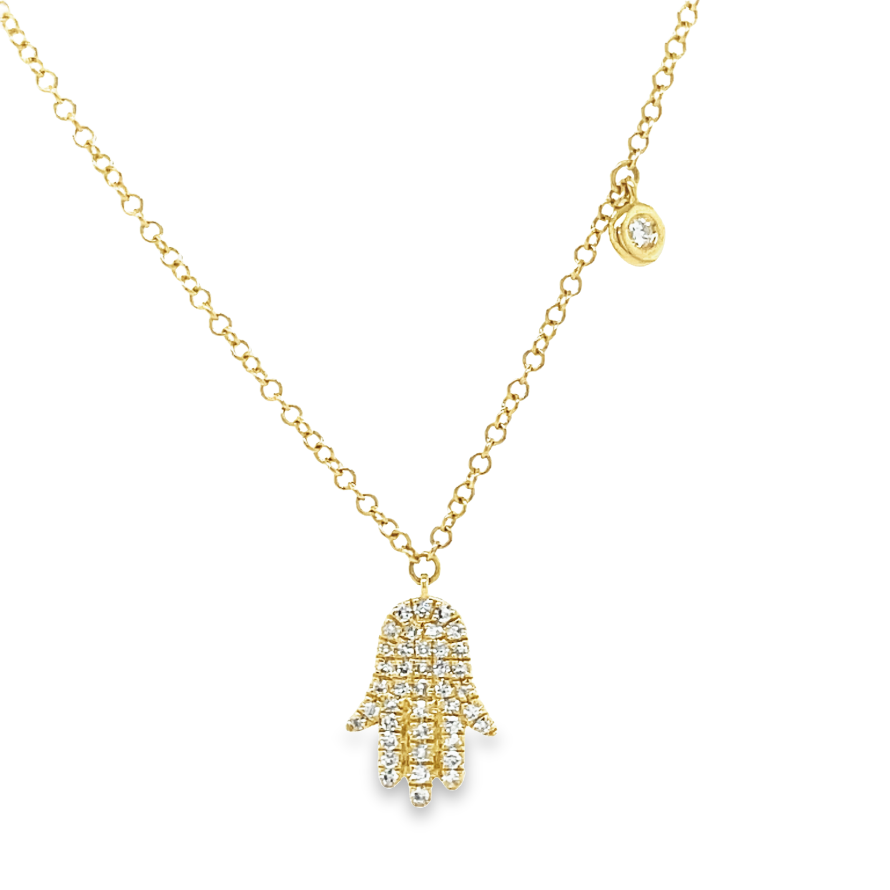 Adorn your neck with this dainty, yet classy diamond pendant necklace! Emblazoned with 0.13 carats of shimmering round diamonds set in 14k yellow gold, this piece features an expertly crafted hamsa with two sizeable loops and a small round diamond on the side. The lobster clasp ensures it stays securely in place on your neck at 18" long. Stylish and secure!