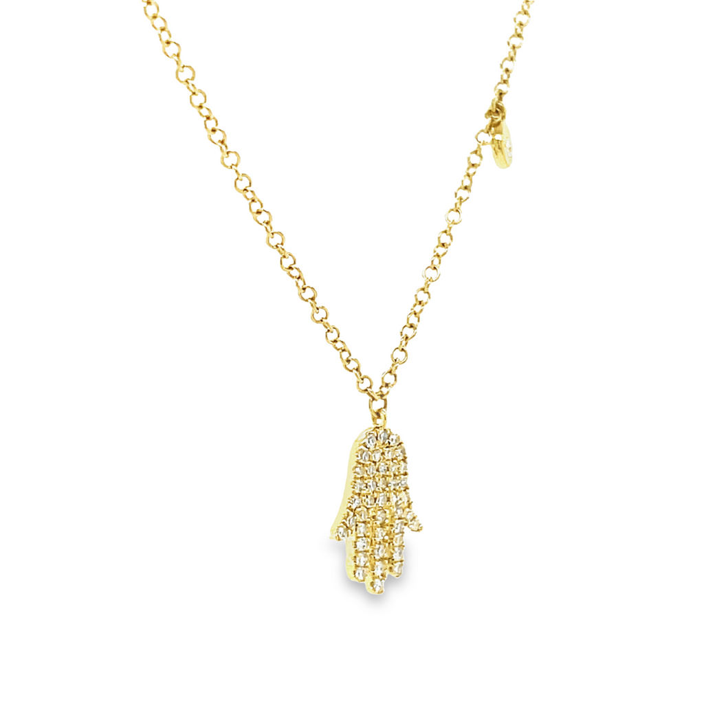 Dainty diamond necklace 0.13 cts  Round diamonds   14k Yellow Gold  Secure lobster clasp  12.00 mm hamsa  18" long including 2 sizeable loops  Small round diamond on the side 