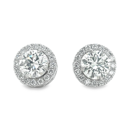 Discover maximum versatility with these round diamond-studded jackets. Crafted with 14k white gold these pieces feature only the finest quality diamonds in F/G grading and 0.90 carats of stunning round diamonds. Wear as a stud earring, or fold down the extender for a unique look. Diamond stud not included.