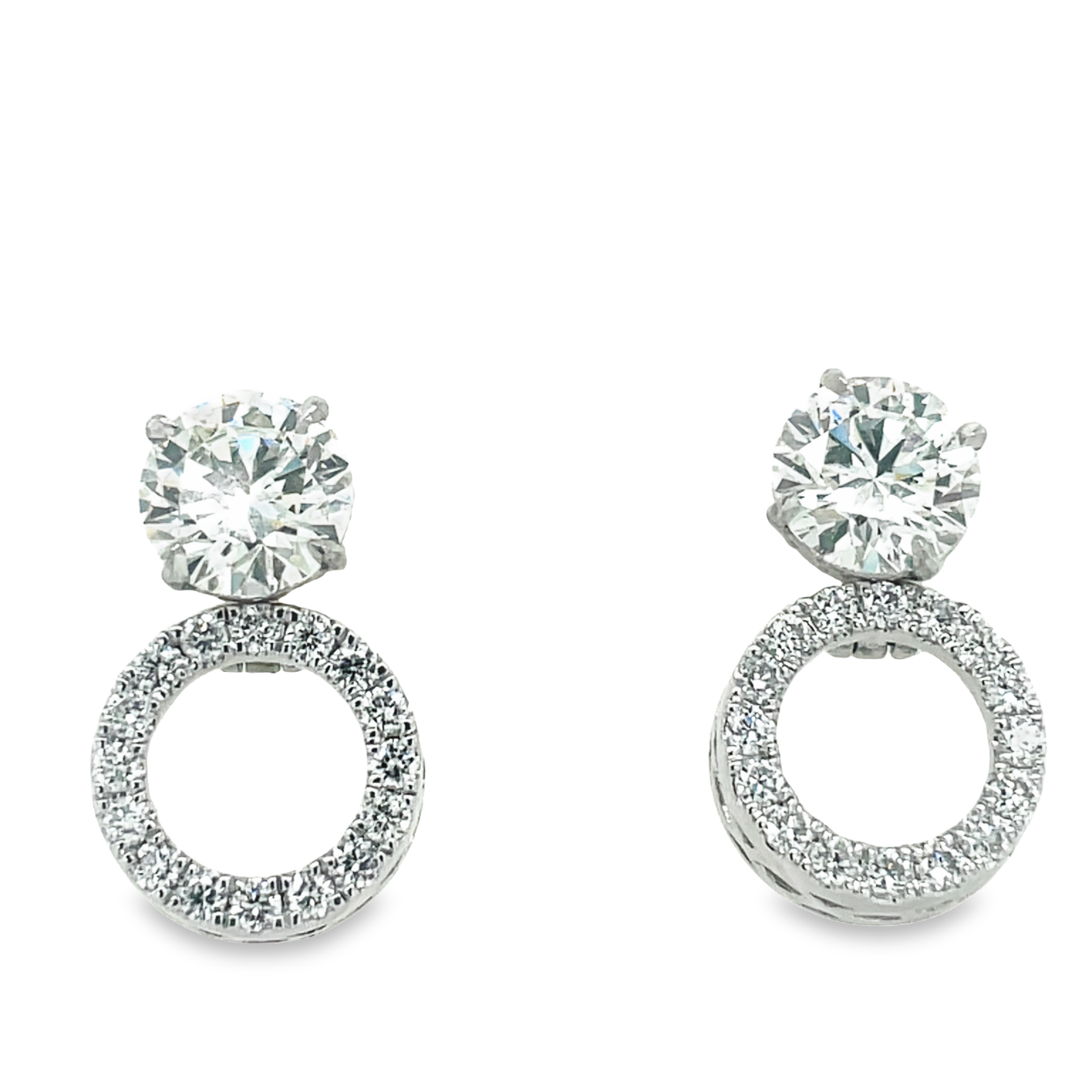 Discover maximum versatility with these round diamond-studded jackets. Crafted with 14k white gold these pieces feature only the finest quality diamonds in F/G grading and 0.90 carats of stunning round diamonds. Wear as a stud earring, or fold down the extender for a unique look. Diamond stud not included.