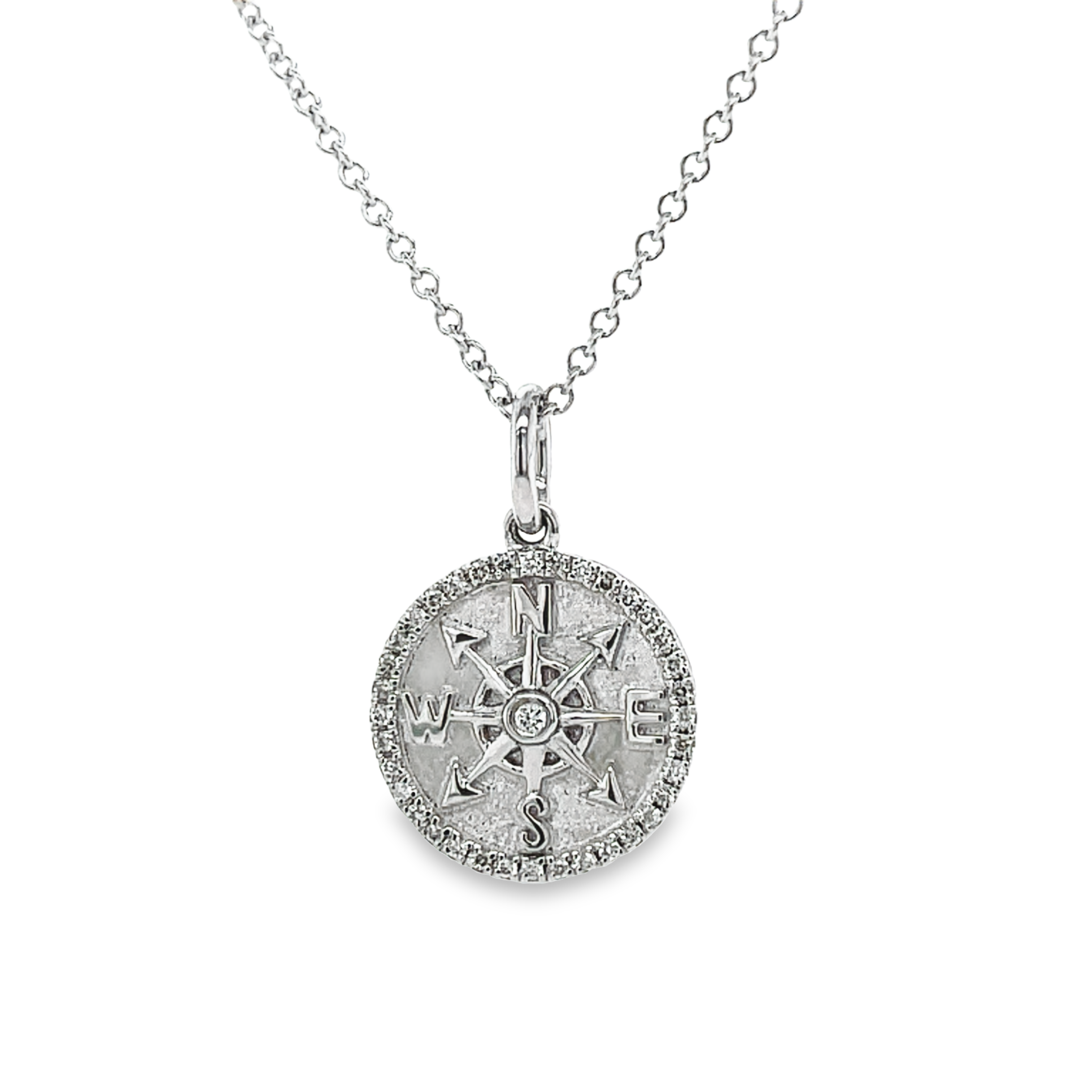 Beautiful compass pendant.  14k white gold.  Secure bail  Round diamonds 0.12 cts   18.00 mm length (including bail)  18" 1.3 mm gold chain available (optional, not included in price) $299.00