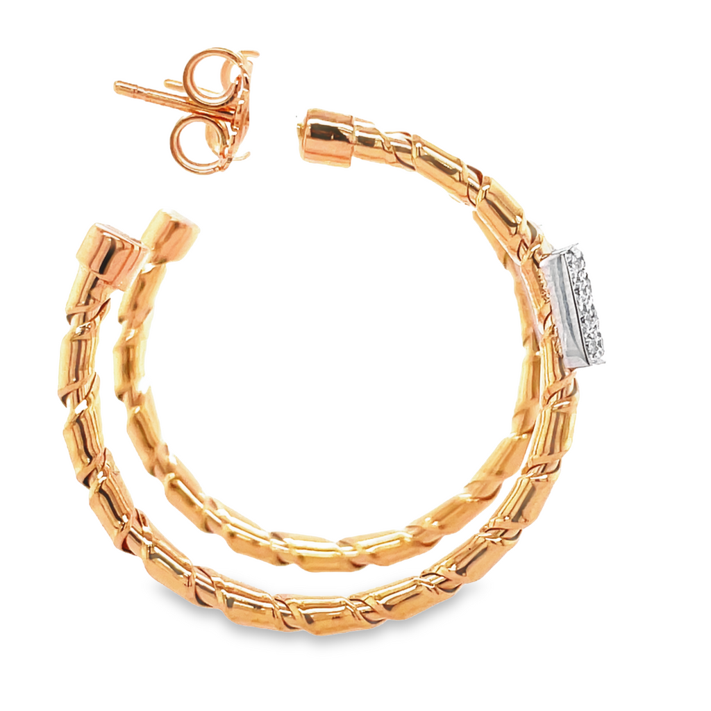 This timeless, radiant design is crafted from luxurious Italian 18K rose gold, shimmering with exquisite round diamonds (0.32 cts) for a stunning sparkle. With its innovative Tubo gas technique, this flexible hoop is the perfect way to add a touch of glamour to your look. 4.30 mm wide, 1.5" long. 