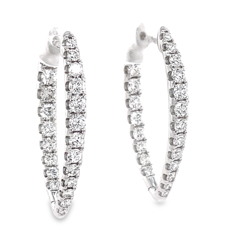 Large hoops   2.00 mm thickness  35.00 mm long  Round diamonds 2.32 cts  F/G color  VS1 clarity  Secure & easy hinged system  18k white gold