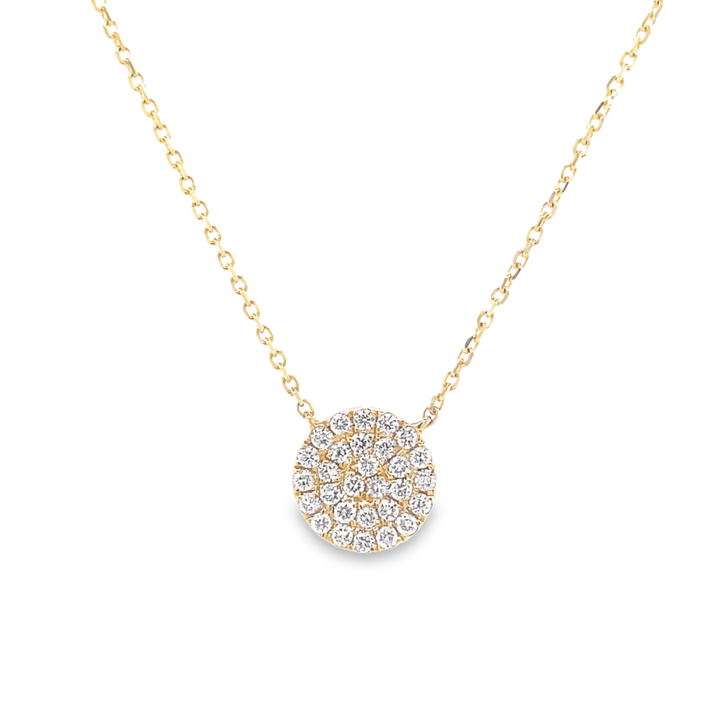 Awe-inspiring 14k yellow gold pendant with 0.31 cts. round diamond center boasting a F/G color. Measuring 10.00 mm (including bail) and strung on a 16" yellow gold chain - this circle pendant necklace is sure to make a lasting impression!