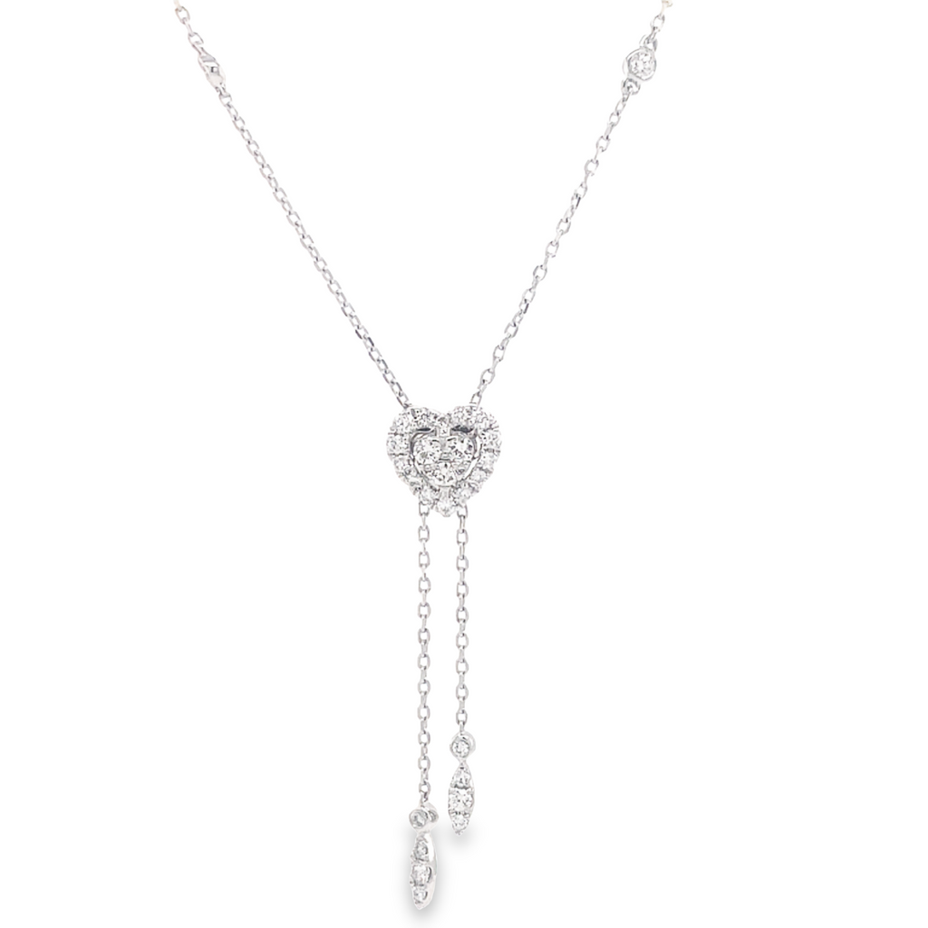 18" length.  Round white diamonds 0.49 cts  Four round bezel diamonds   4" of loose dainty chain with diamonds at the end   Secure lobster catch  Adjustable heart pendant   14k white gold.