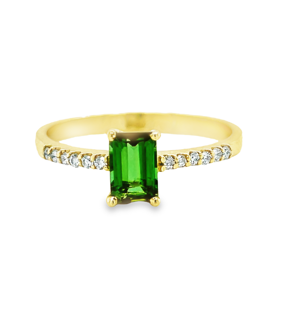 Set in 18k yellow gold.        Size 7.5  Emerald cut tourmaline  7.00 mm   Round diamonds 0.12 cts
