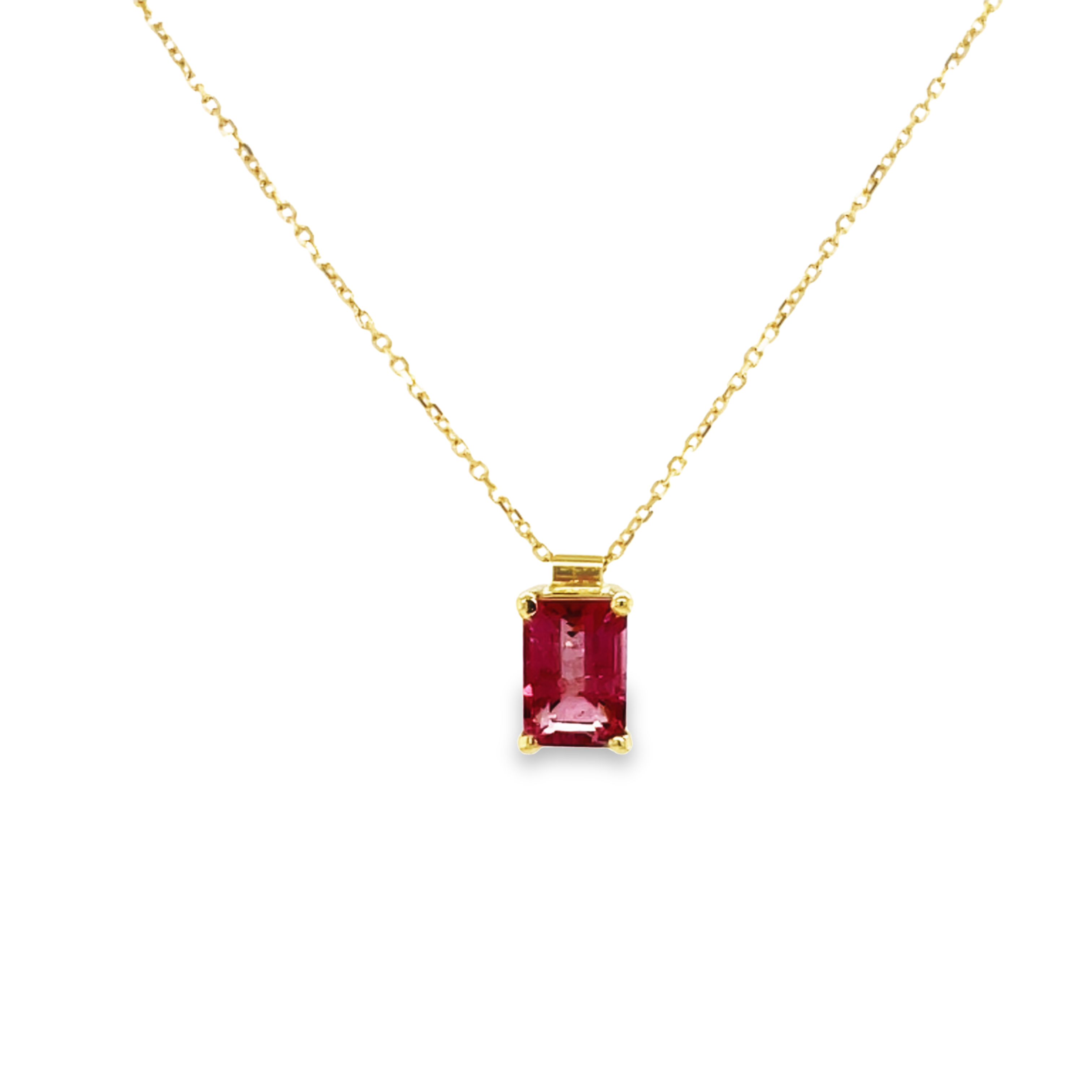 Beautifully crafted in 18k white and yellow gold, this stunning 0.40 cts pink tourmaline baguette cut pendant sparkles with a 8.00 x 5.00 mm gemstone (including bail) and an 18" chain.