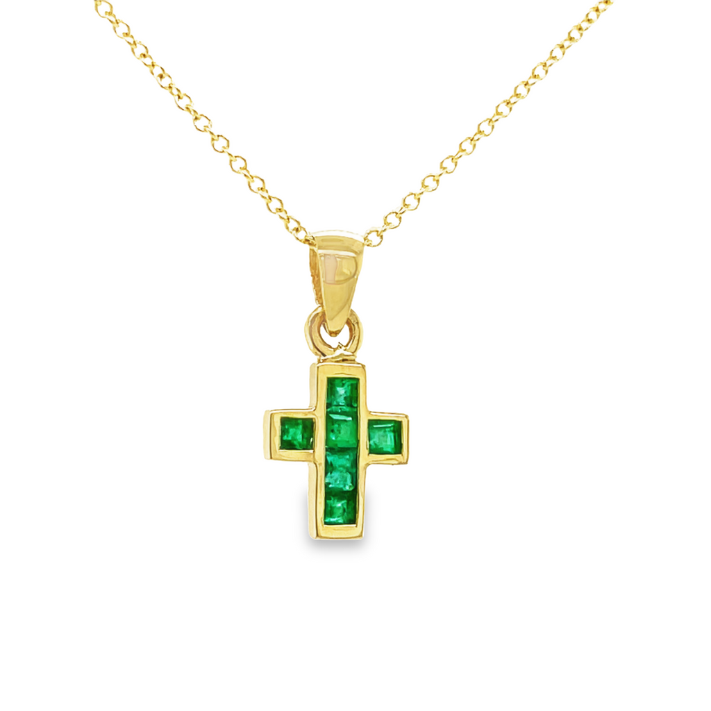 14k yellow gold cross.  6 princess cut emeralds 0.54 cts.  16.00 mm including bail. Invisible setting.  16" yellow gold chain optional $190.00