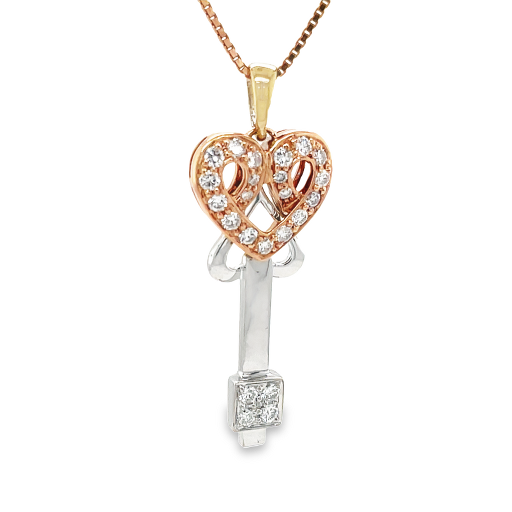 18k rose & white gold.  Italian made  Polished finish  35.00 mm  Secure solid bail  Round diamonds 0.50 cts  18" long box chain ($260.00 optional).