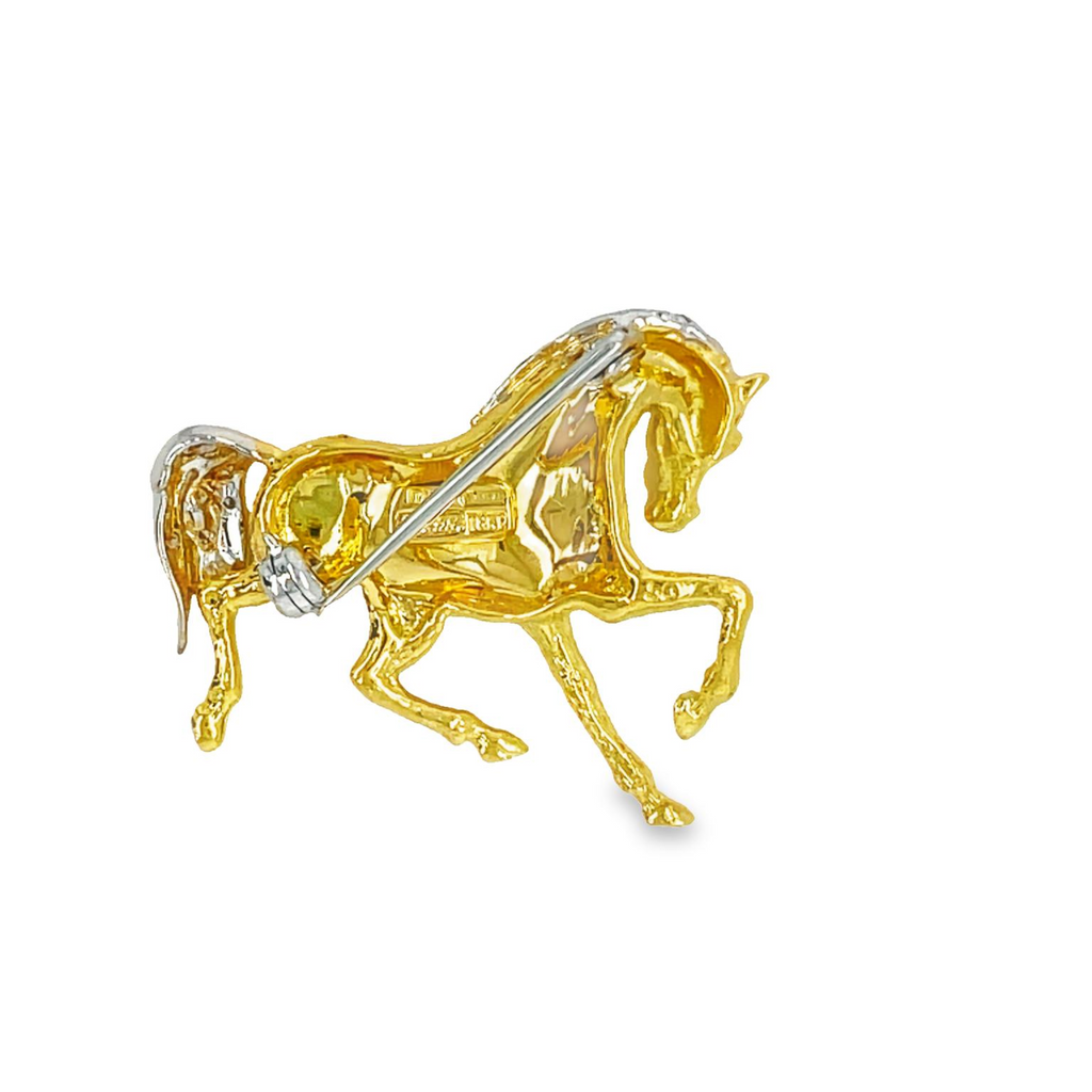 Very stylish  Great workmanship  18k yellow gold.  Italian made.  Horse pin 1" long  Round diamonds 0.09 cts   Secure pin system