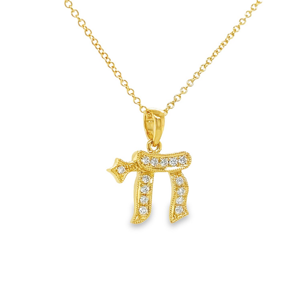 Luxurious 18k yellow gold and dazzling 0.09 cts F/G round diamonds with a secure bail offer an exquisite touch to this 15.00 x 12.00 mm Diamond Chai Pendant. An optional 16" gold chain is available for only $199!