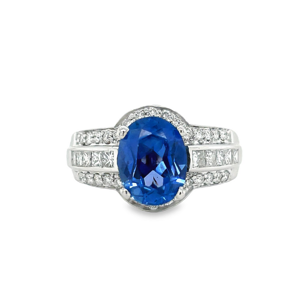 18k white gold  7.0 size (sizable)  Thick & wide ring   Faceted oval blue sapphire 2.96 cts  Round diamonds 1.20 cts  12.50 mm wide tapered 6.50 mm 