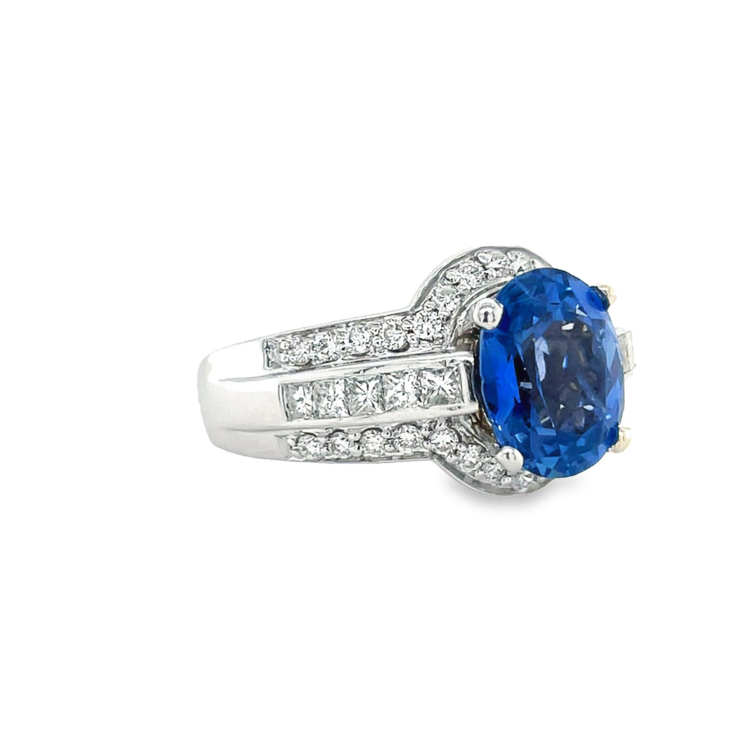 18k white gold  7.0 size (sizable)  Thick & wide ring   Faceted oval blue sapphire 2.96 cts  Round diamonds 1.20 cts  12.50 mm wide tapered 6.50 mm 
