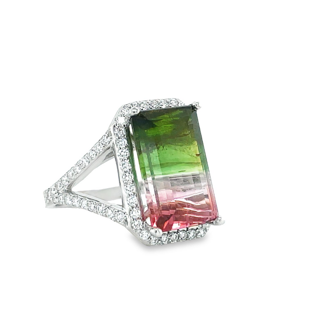 This stunning watermelon tourmaline and diamond cocktail ring is crafted in 14k white gold. It's set with a watermelon tourmaline centerpiece and accentuated by a brilliant halo of diamonds for a truly unique look. Designed for special occasions, this sophisticated piece of jewelry will make a lasting impression.  This ring was made in our store  Size 6.5  19.00 x 16.00 mm