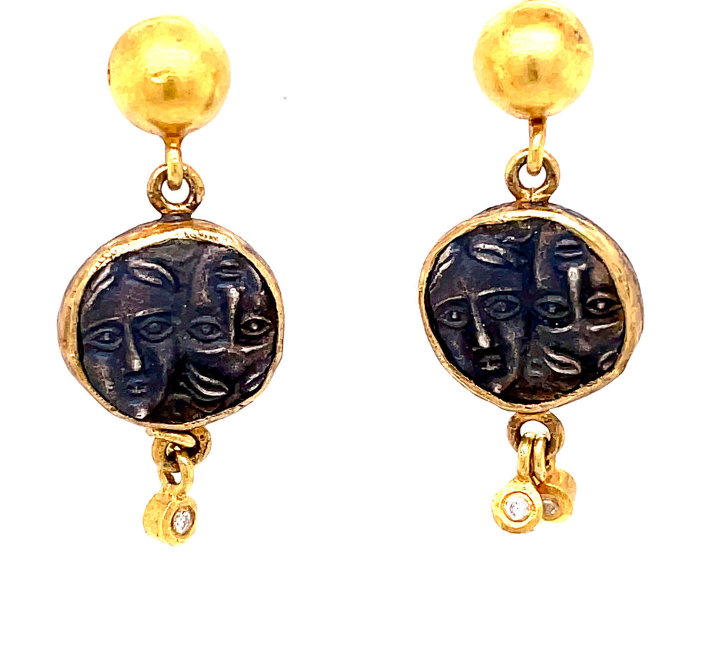 Made is Turkey  Handcrafted  24k yellow gold  Oxidized sterling silver   26 mm long  Secure post  Four small round diamonds   These coins were used as a theater ticket in Ancient Rome, they represent duality 