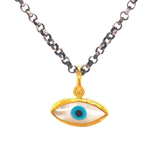 This luxury pendant measures 15.00 mm with a matte finish crafted from 24K gold. Handmade in Turkey, this stylish piece is complete with an optional oxidized sterling silver chain with a secure lobster catch for $75. The chain measures 17" in length.