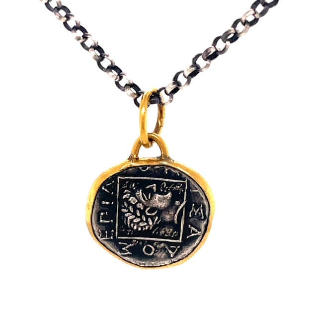 Round coin style   15.00 mm   24k gold  Matte finish   Small round diamond  Handmade in Turkey  Oxidized sterling silver chain with secure lobster catch ($75)  17" long