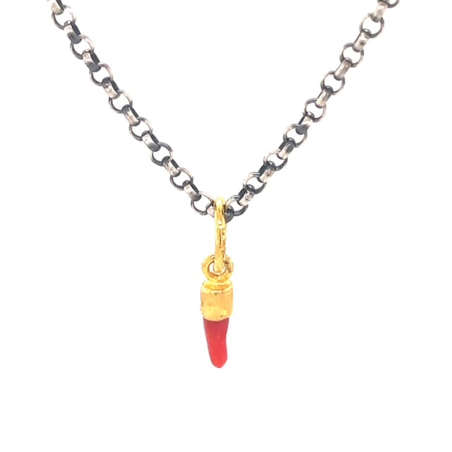 The 24K gold Cornicello pendant carries a special significance, bringing protection against the evil eye. Crafted with Turkish precision, it comes with a matte finish for an eye-catching look. The optional oxidized sterling silver chain ($75) provides a secure fit with its lobster catch, measuring 16" in length.