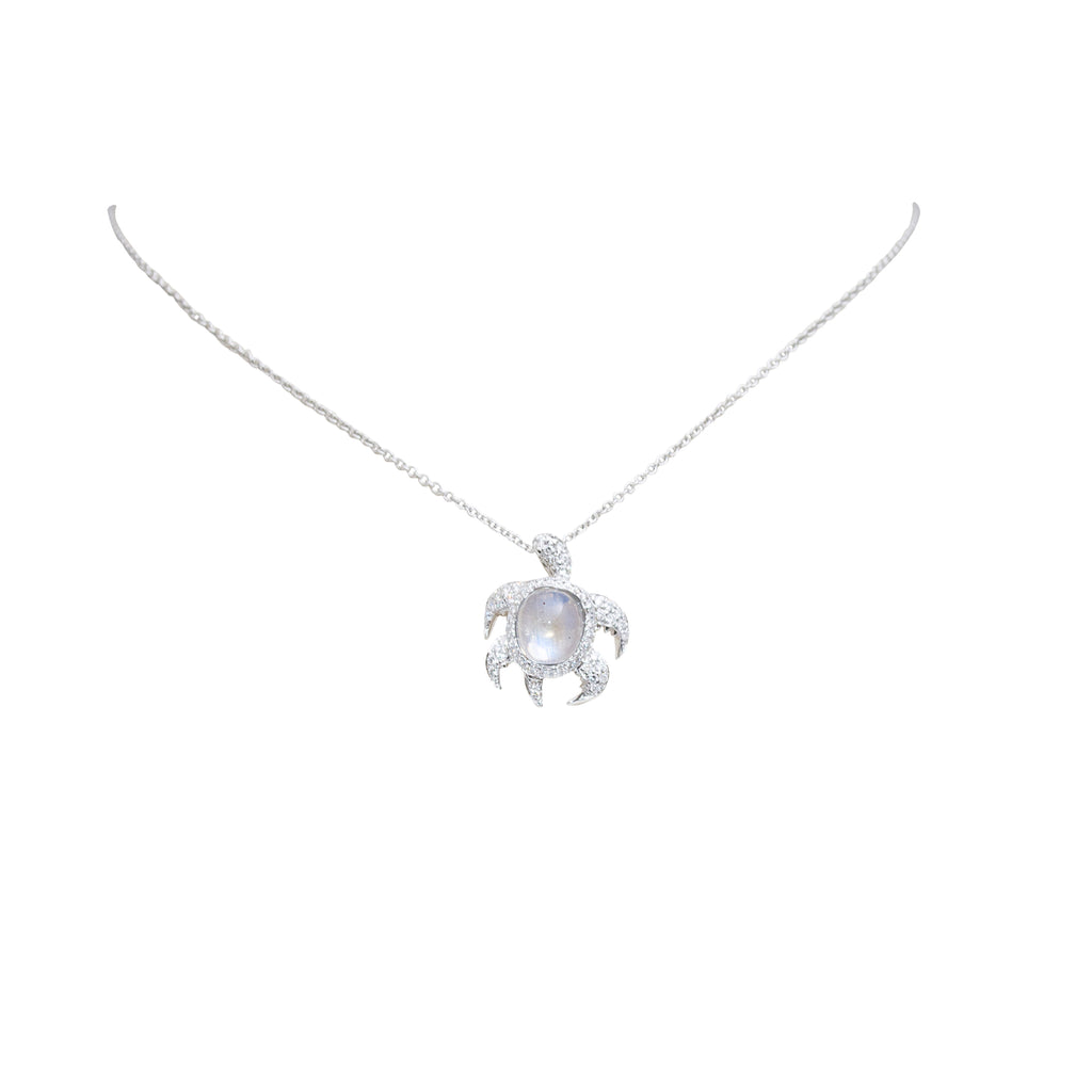 18k white gold charm Turtle charm has a cabochon moonstone1.87 cts All pave diamonds 0.44 cts 19.00 mm charm size Hidden clasp Gallery finish at the back 14k white gold chain with secure lobster catch $205.00