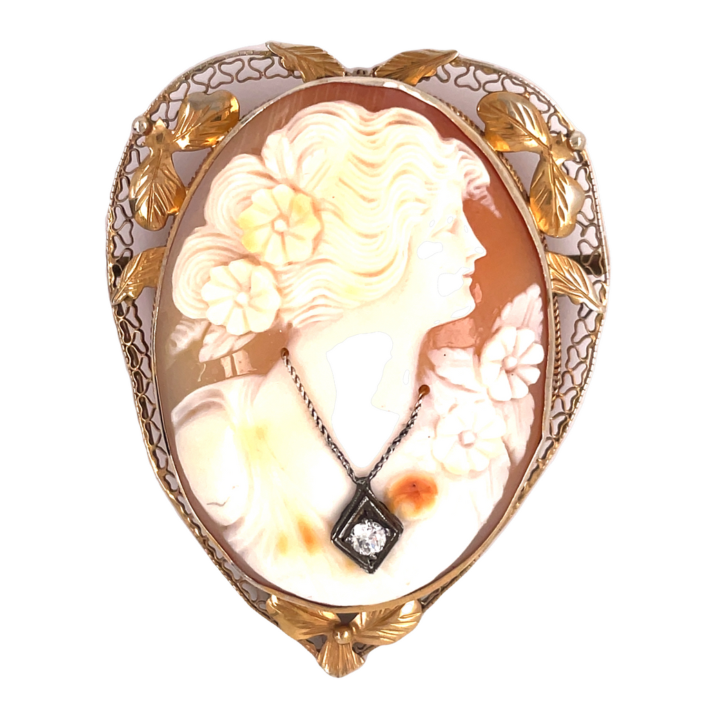 This stunning antique 14k gold Cameo set with a single diamond of 0.05 carats radiates beauty and sophistication! Perfectly preserved in great condition, it can be used as a pin or pendant for any special occasion.