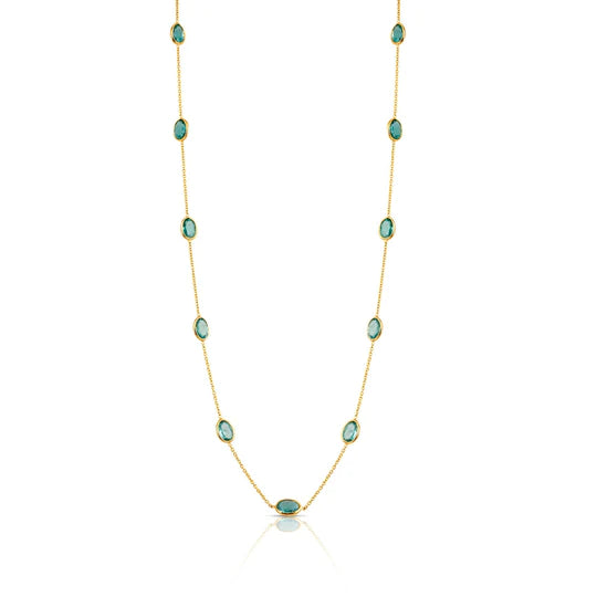 Expertly crafted with 18k yellow gold, this Faceted Oval Emerald by The Yard Necklace showcases 13 stunning emeralds, totaling 2.67 cts. Measuring at 6.50 x 4.30 mm, these bezel-set gems are securely held by a catch. Perfectly sized at 18", with an additional sizing loop at 16", it's a timeless addition to your jewelry collection.